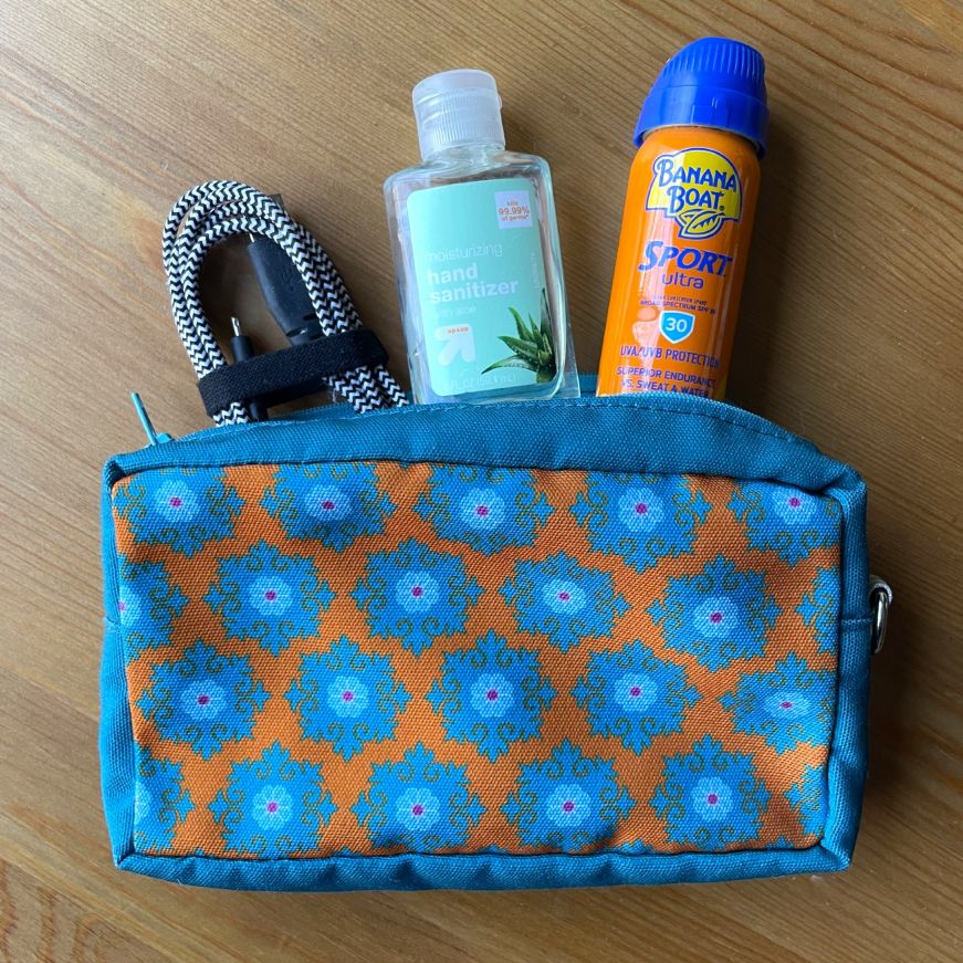 Zipper pouch with a blue and orange design