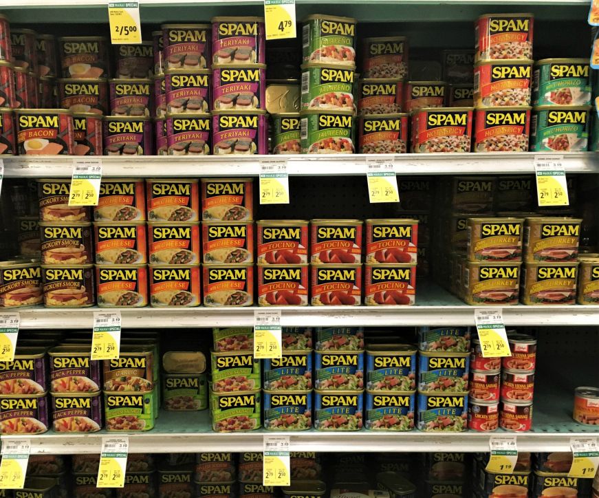 Grocery store shelves with several varieties of Spam, Hawaii