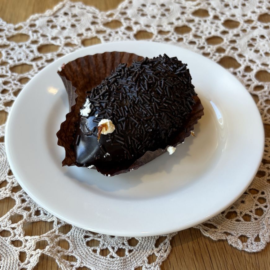 Pastry decorated with chocolate sprinkles to look like a hedgehog 