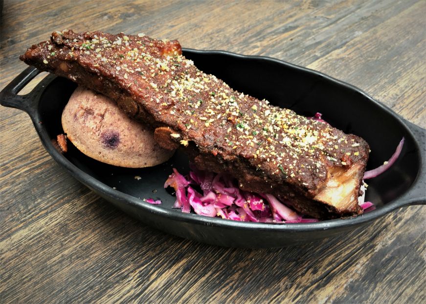Smoked Kaadu Pork Ribs, Docking Bay 7, Galaxy's Edge, Disney's Hollywood Studios Rack of ribs with blueberry corn muffin and purple cabbage slaw, Docking Bay 7, Galaxy's Edge, Disney's Hollywood Studios