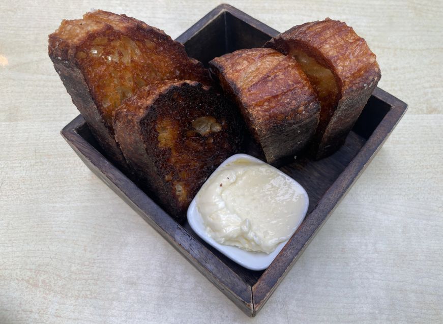 Rectangular dish with slices of toasted sourdough