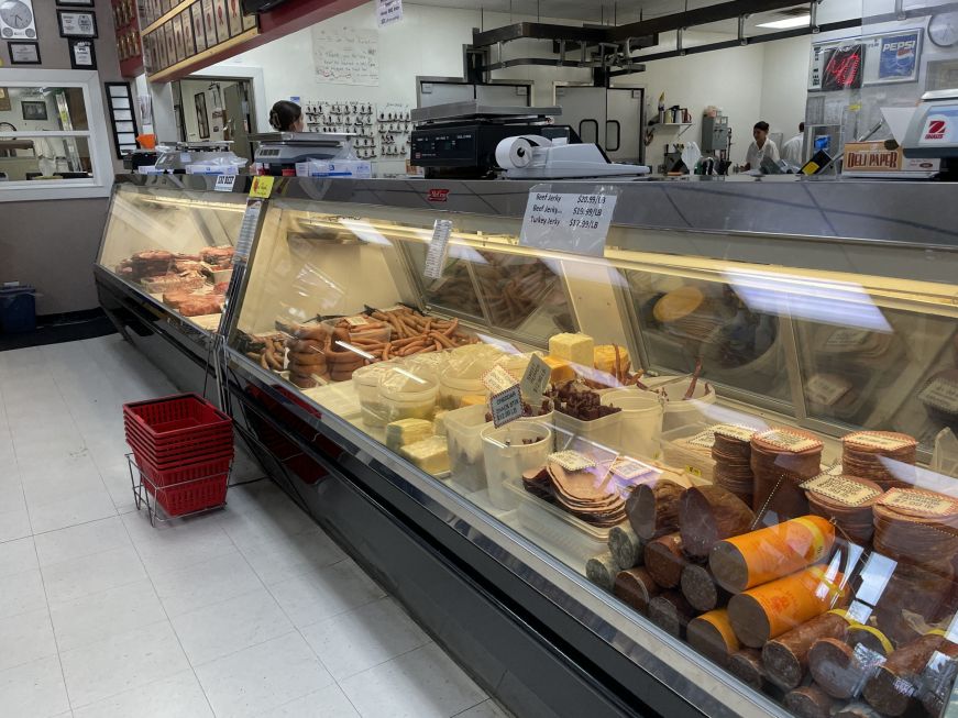 Butcher case with sausages and cold cuts