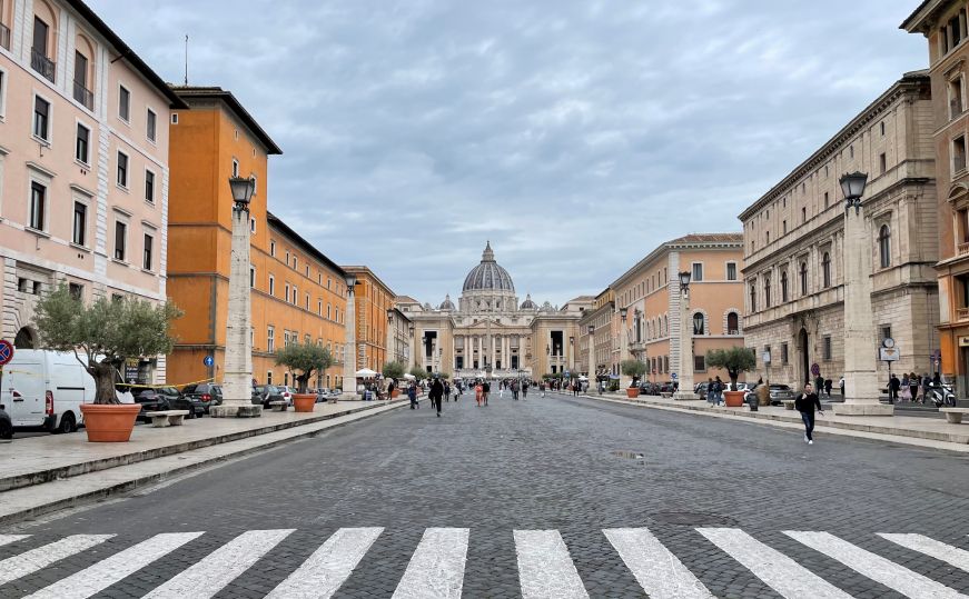 St. Peter's Basilica and Vatican City Large church with a dome