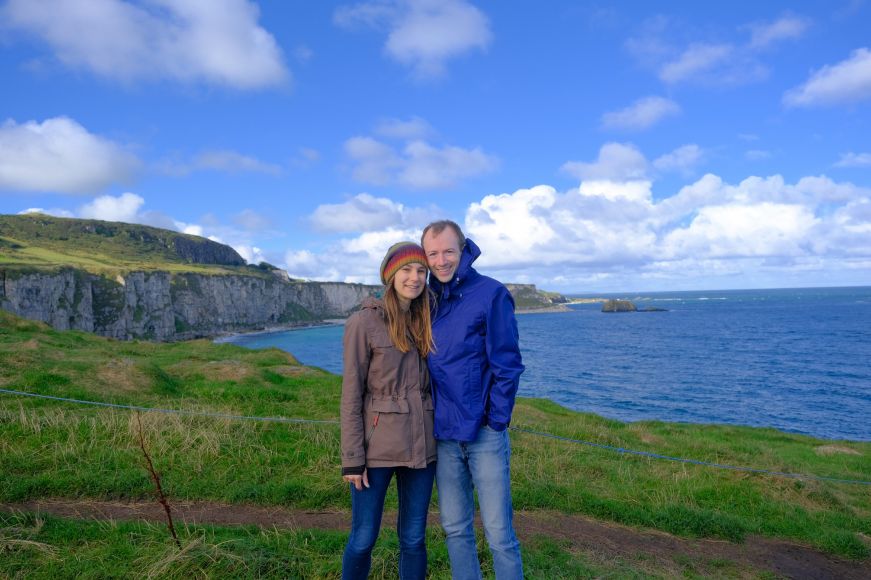 Stacy and Mike with a brilliant green landscape in the background