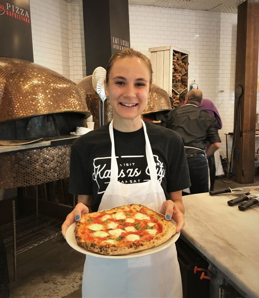 Stacy holding a margherita pizza, 1889 Pizza Napoletana, Kansas City, Kansas