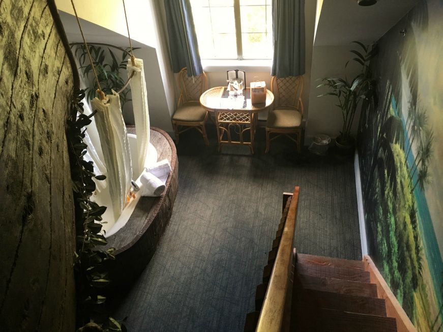 View from top of staircase in Castaway Isle room, Chateau Avalon, Kansas City, Kansas