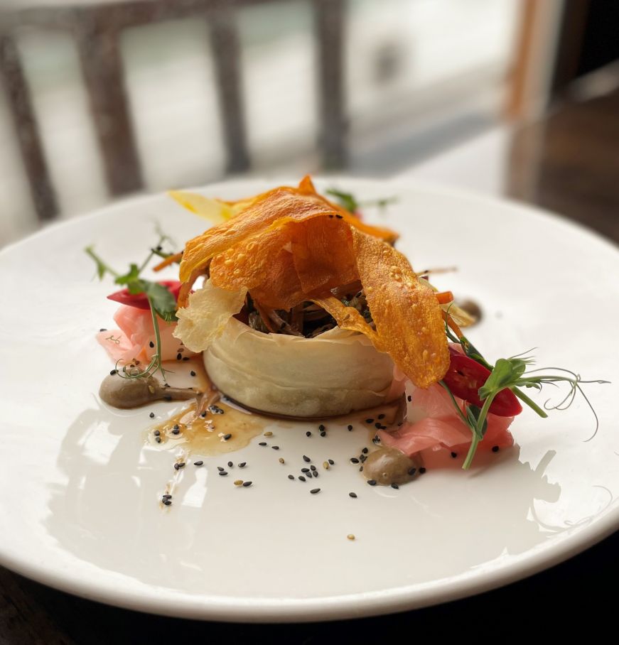 Ring of filo pastry filled with stir fried vegetables