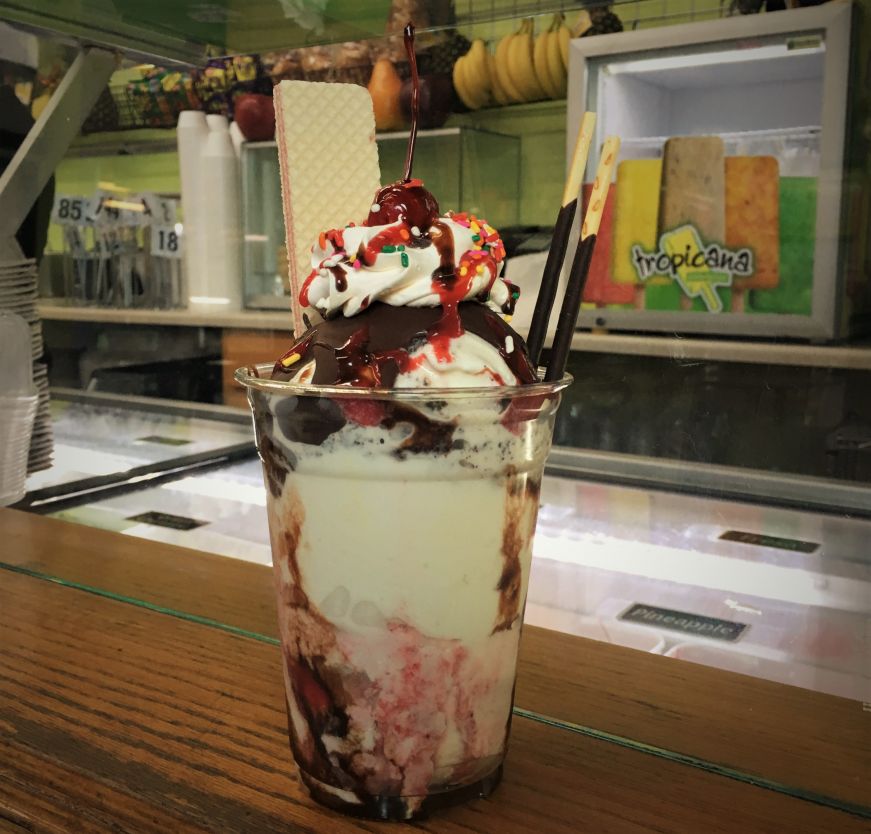 Ice cream sundae sitting on counter at Paleterias Tropicana, Kansas City