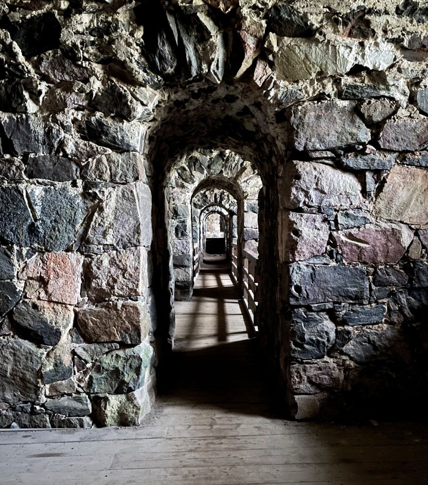 Suomenlinna interior passage View through a series of portals in a hallway made from stone