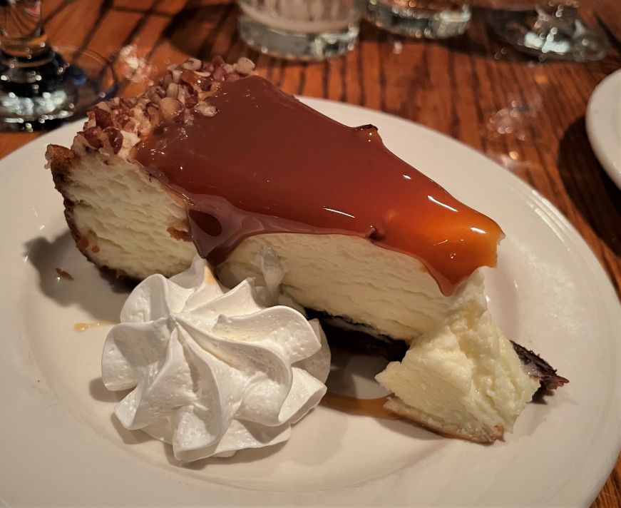 Turtle cheesecake, Chanhassen Dinner Theatres Slice of cheesecake with a caramel topping