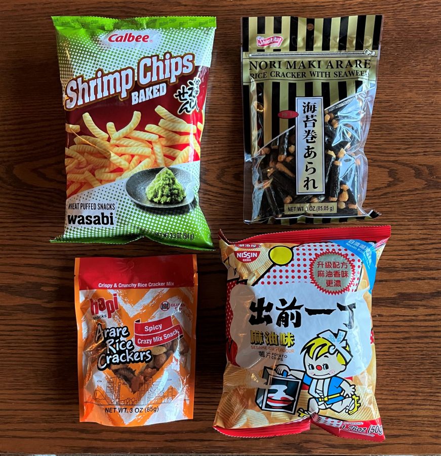 Colorful bags of chips and rice crackers