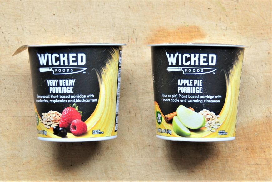 Two cardboard cups of instant oatmeal