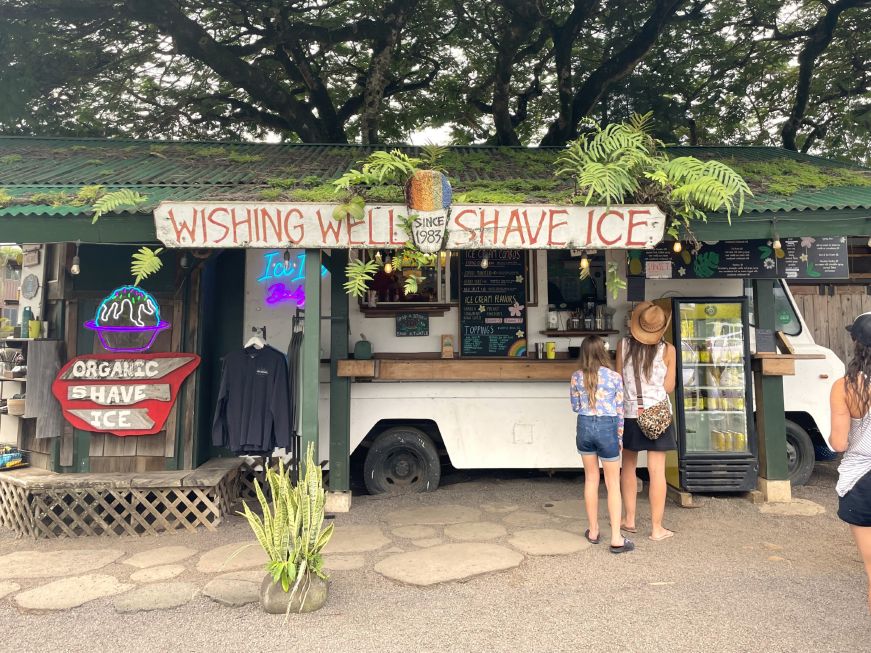 Vintage bus that has been converted into a shave ice stand 