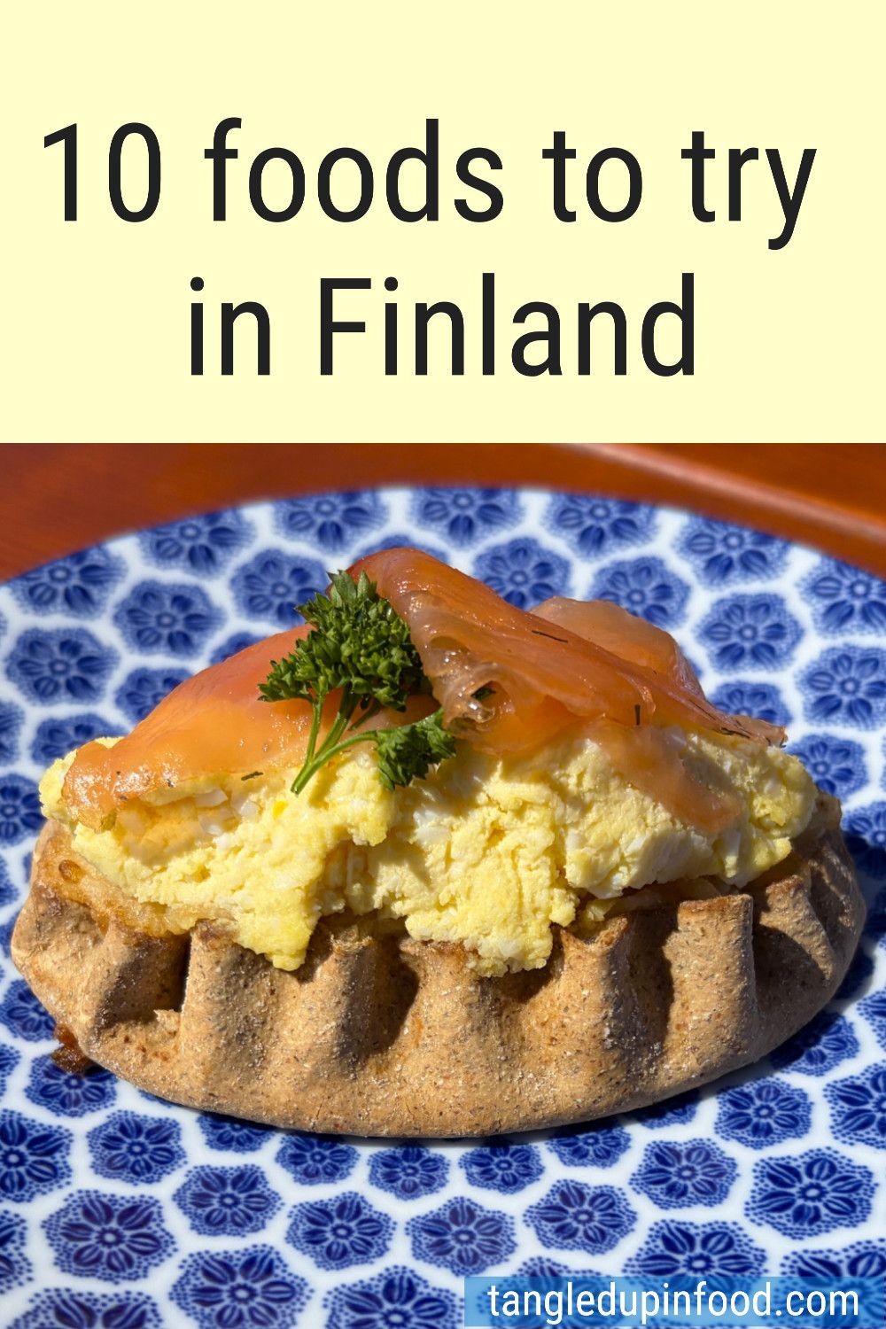 Photo of Karelian pasty and text reading "10 foods to try in Finland"