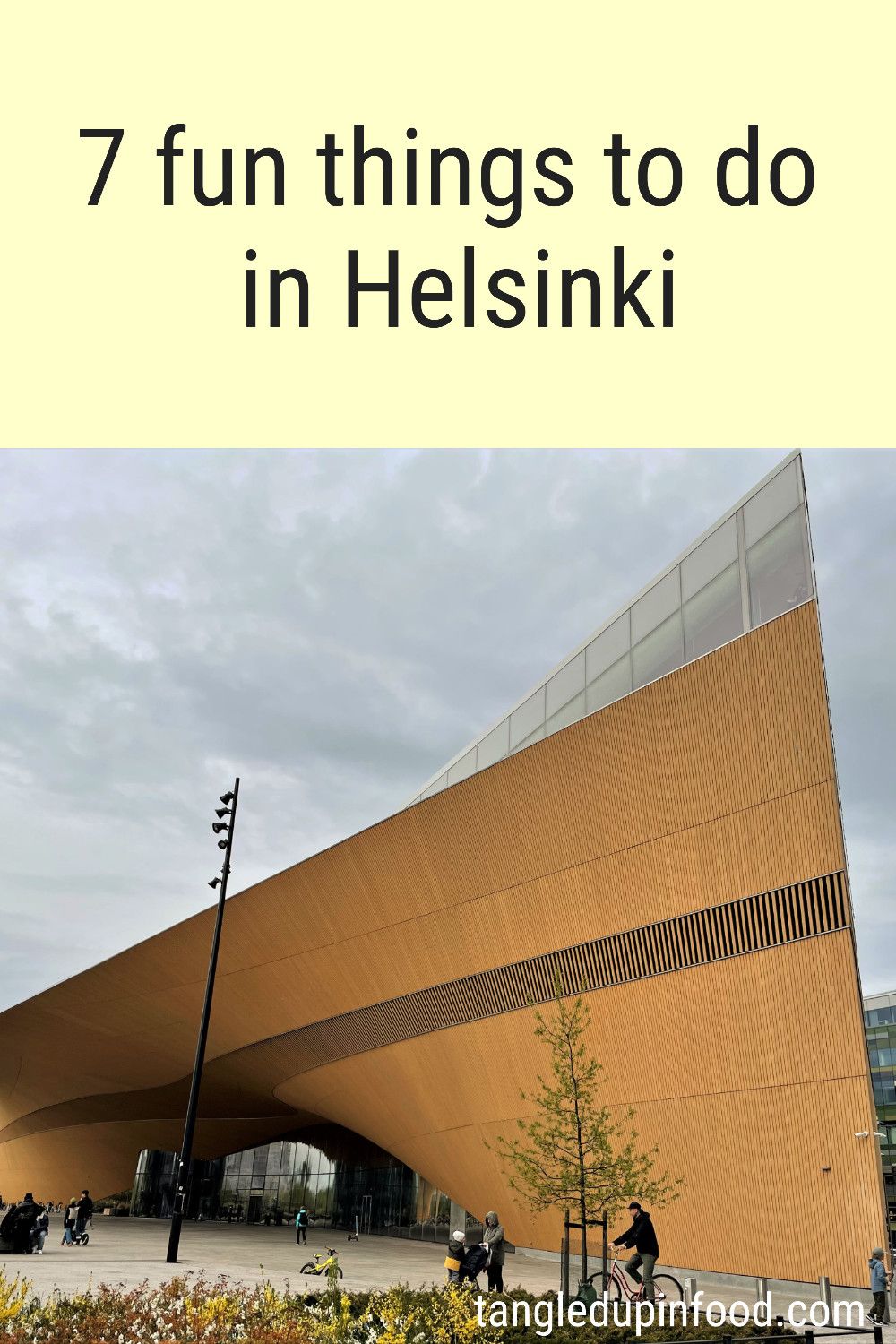 Photo of Helsinki Central Library and text reading "7 fun things to do in Helsinki"