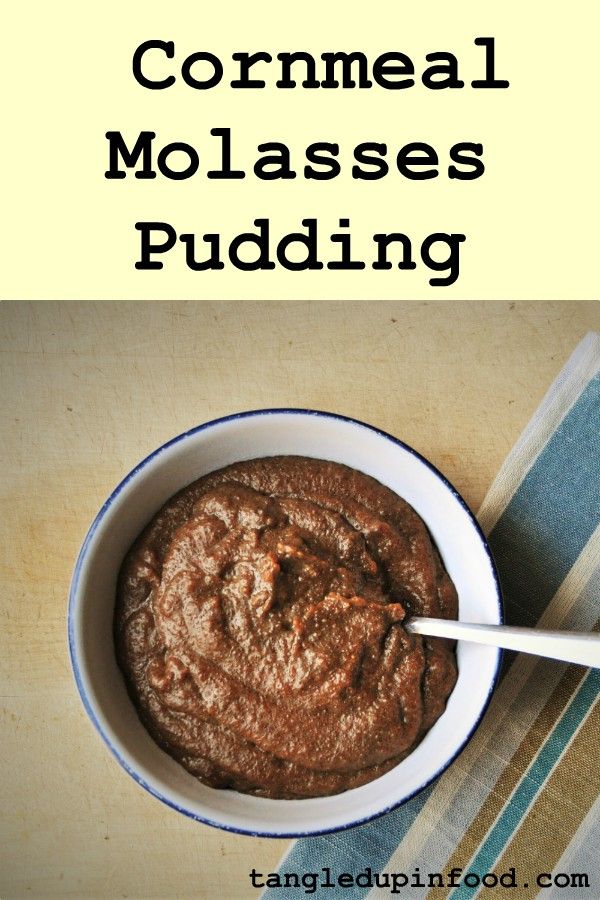 Bowl of cornmeal molasses pudding with text "Cornmeal Molasses Pudding"