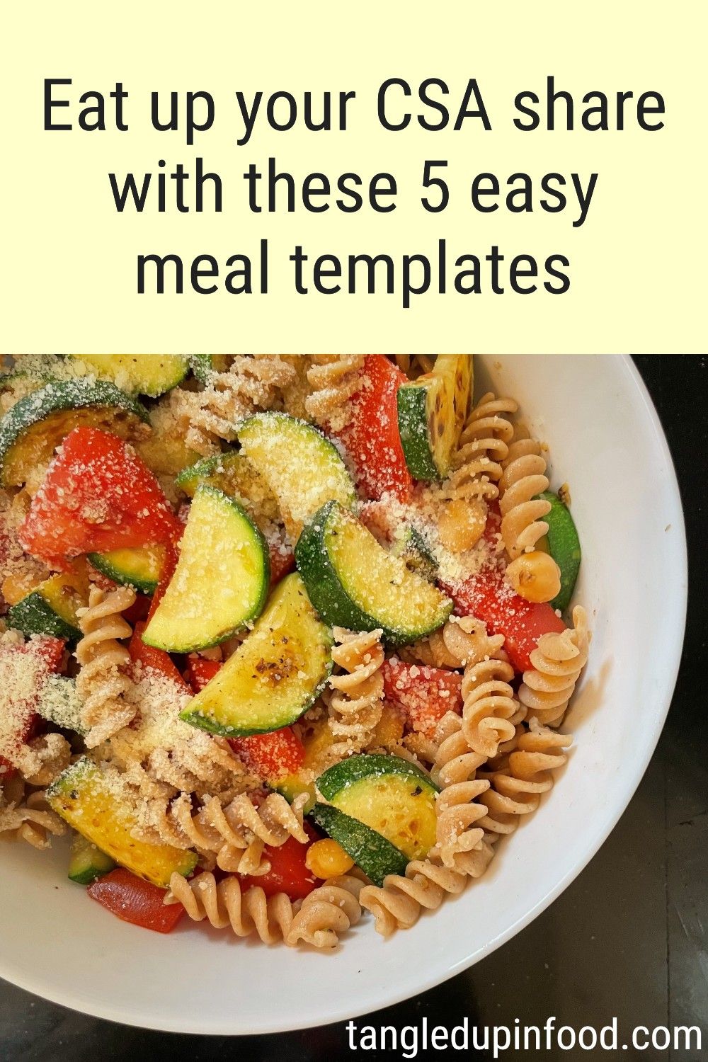 Bowl of rotini pasta with zucchini and tomates with text reading "Eat up your CSA share with these 5 easy meal templates"