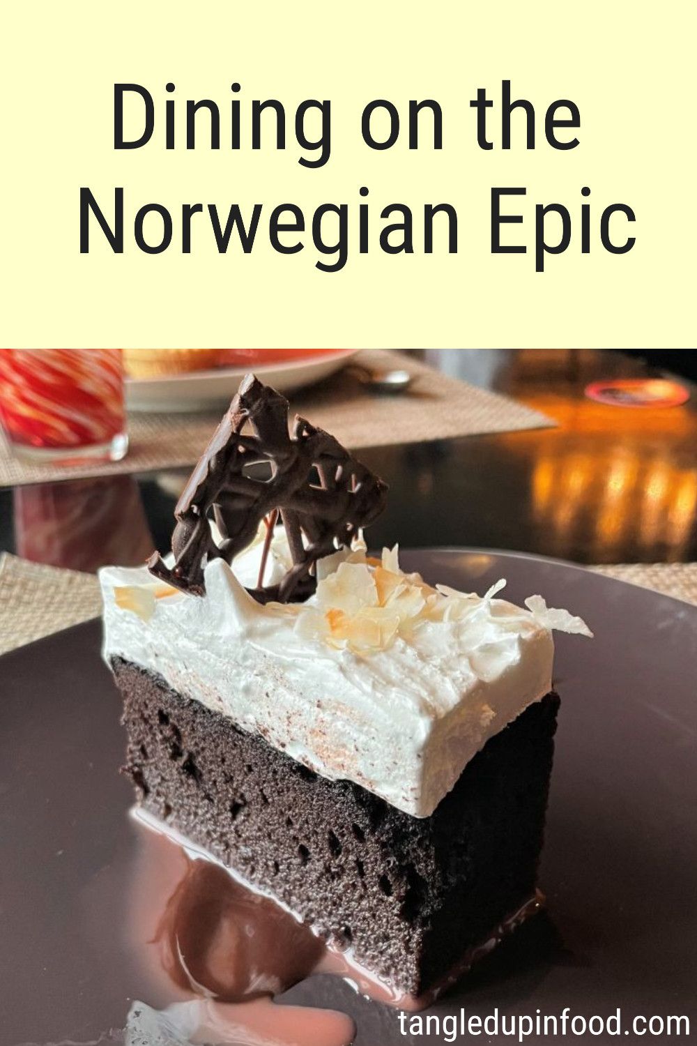 Piece of chocolate cake with text reading "Dining on the Norwegian Epic"