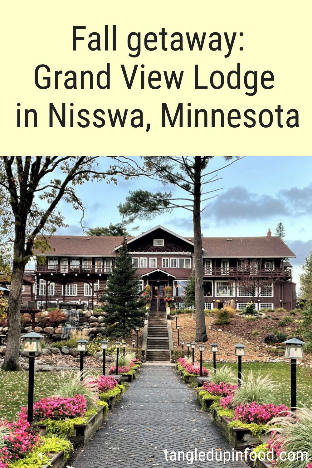 Photo of historic lodge building with text reading "Fall Getaway: Grand View Lodge in Nisswa, Minnesota"
