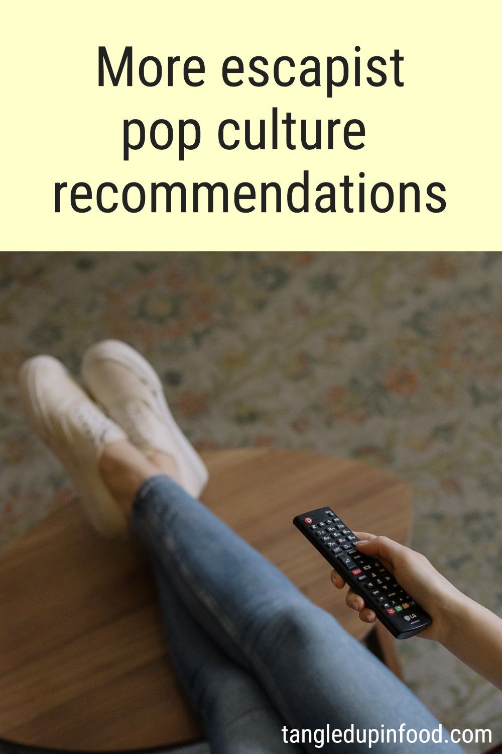 Legs propped up on coffee table and hand holding remote with text reading "More escapist pop culture recommendations"