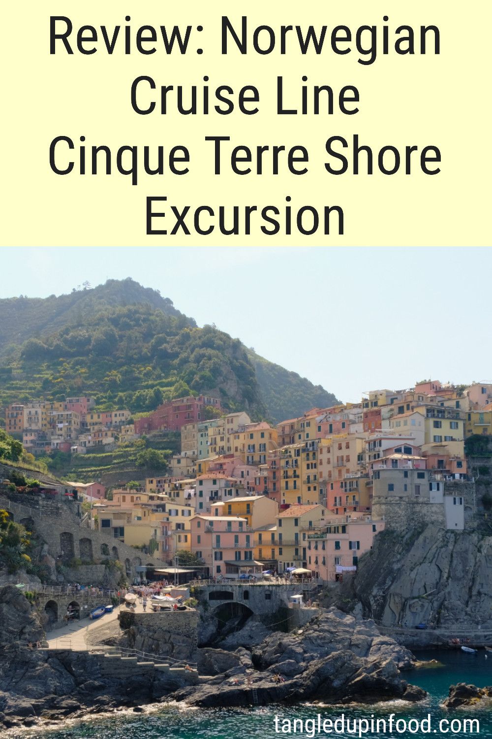 Photo of seaside village with text reading "Review: Norwegian Cruise Line Cinque Terre Shore Excursion"
