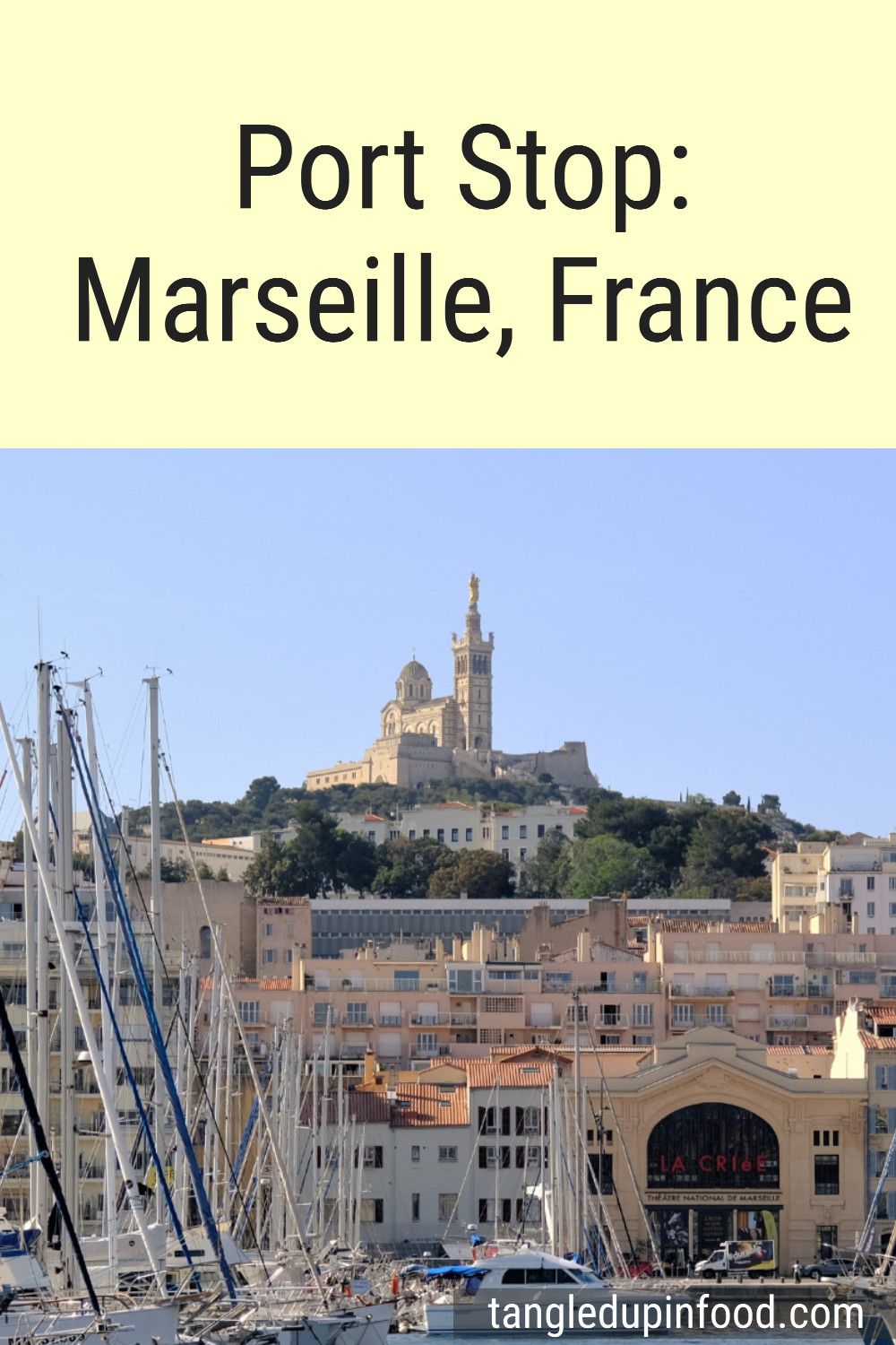 Photo of a marina with a church on a hill in the background with text reading "Port Stop: Marseille, France"