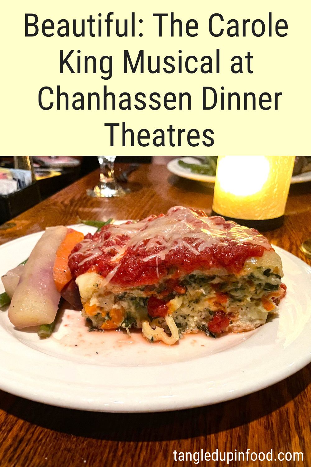 Photo of vegetable lasagna with text reading "Beautiful: The Carole King Musical at Chanhassen Dinner Theatres" 