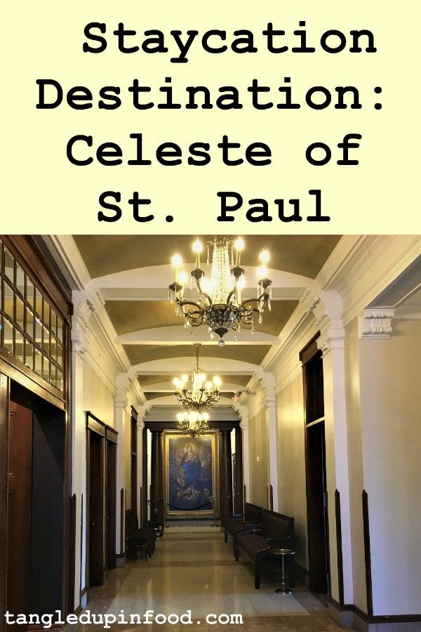 Hallway with chandeliers and oil paintings with text reading "Staycation Destination: Celeste of St. Paul"