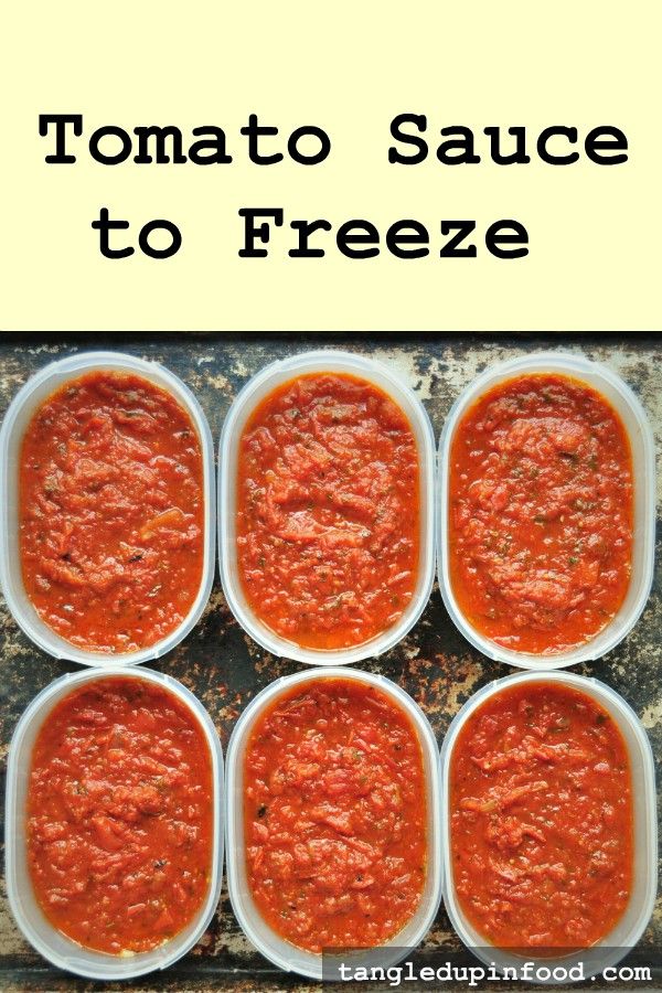 Plastic containers filled with tomato sauce with text reading "Tomato Sauce to Freeze"