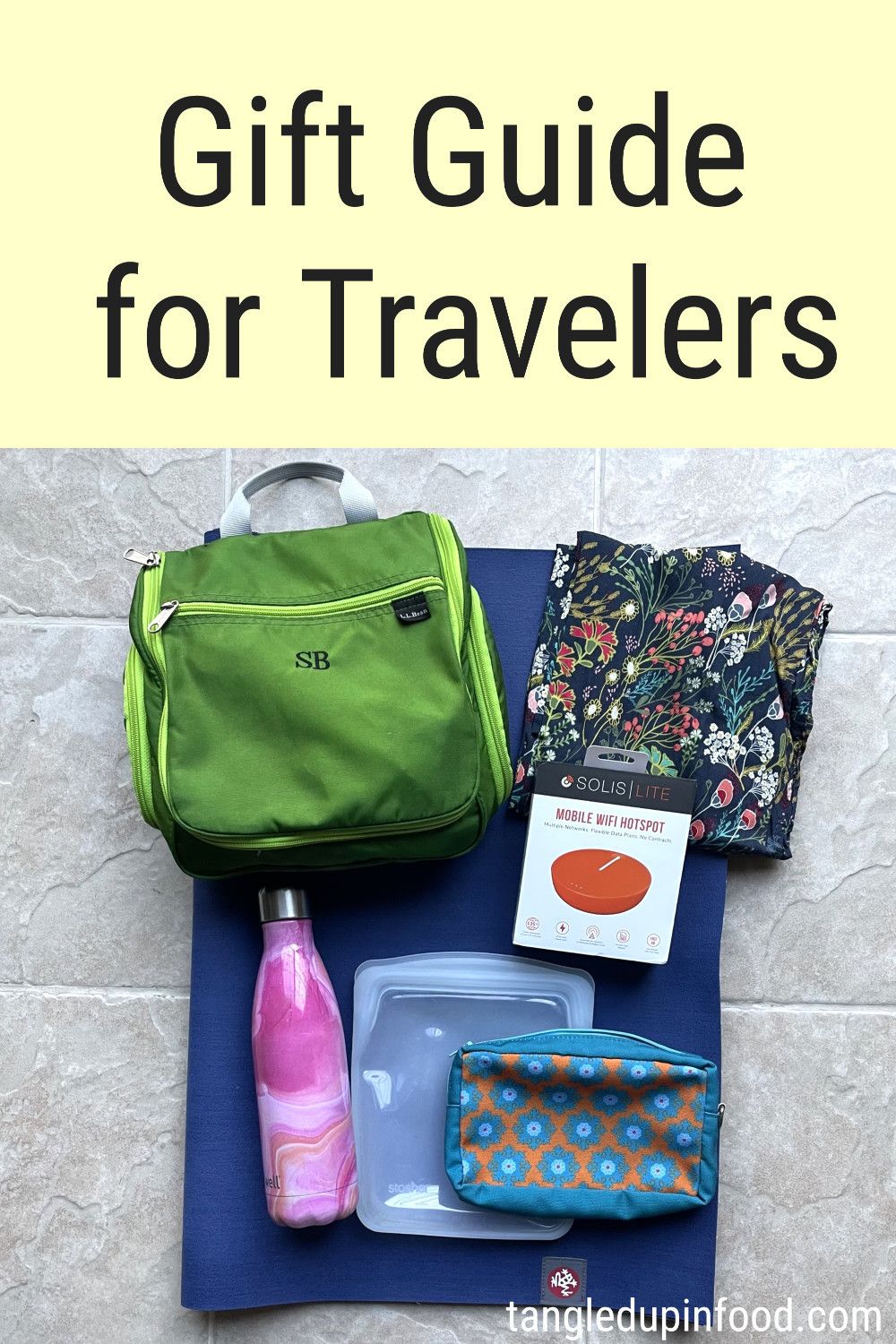 Top-down view of travel gift guide items