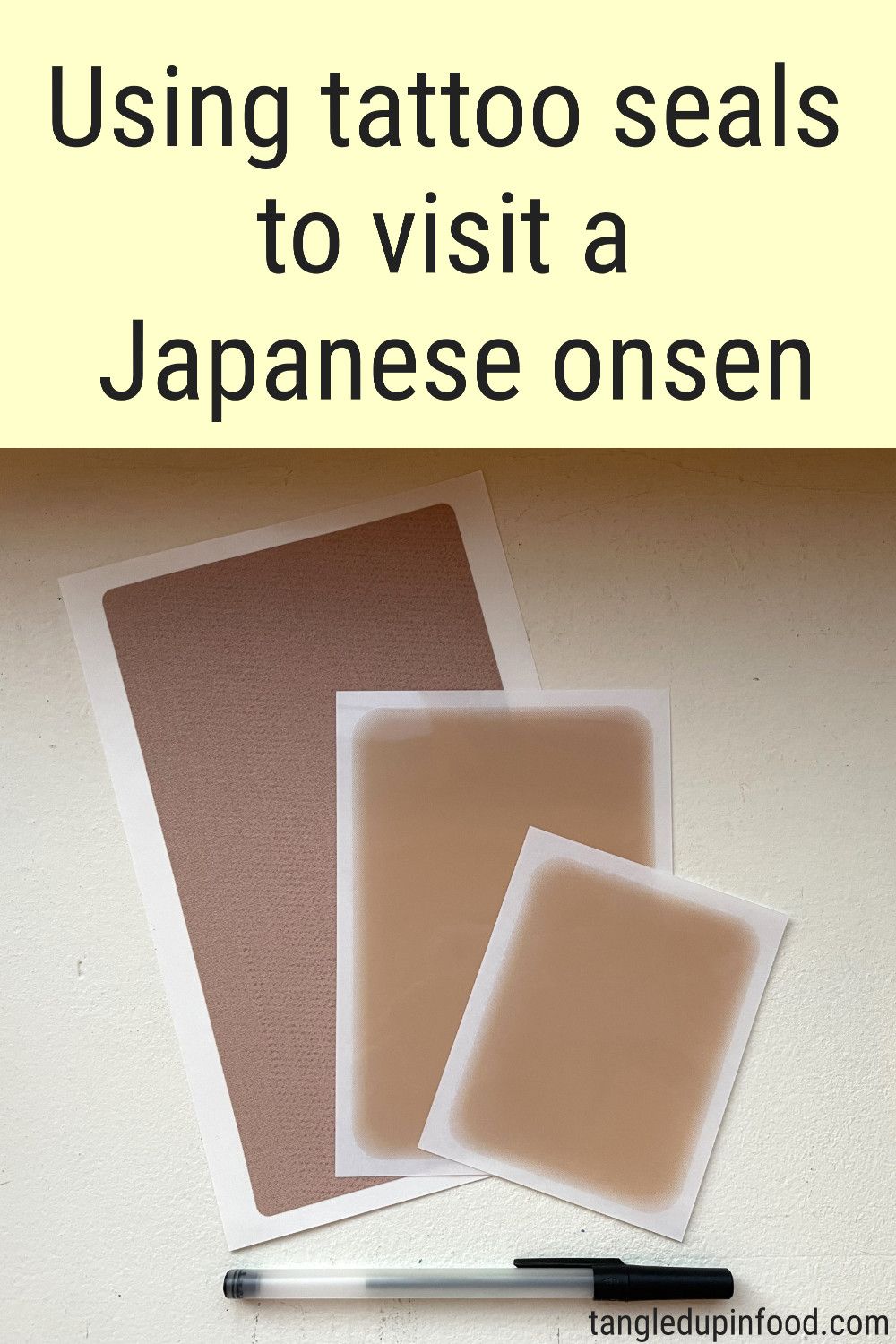 Photo of various sizes of tattoo seals with text reading "Using tattoo seals to visit a Japanese onsen"