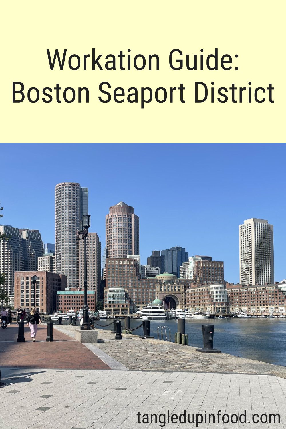 Photo of Boston skyline with text reading "Workation Guide: Boston Seaport District"