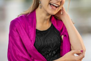 Stacy in black lace dress with pink wrap