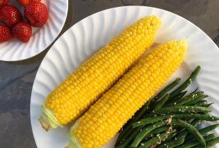 Strawberries, corn on the cob, and green beans