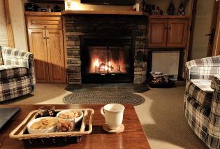 Fireplace in living room at unit in Bluefin Bay