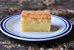 Square slice of Hawaiian butter mochi on a plate