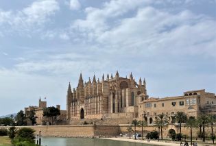 Ornate cathedral overlooking a canal