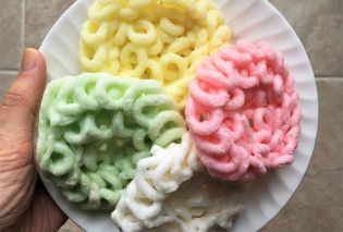 Colorful tapioca crackers on a white plate