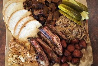 Tray of barbecue ribs, burnt ends, sausage, chicken, and pork at Rosedale Bar-B-Que, Kansas City, Kansas